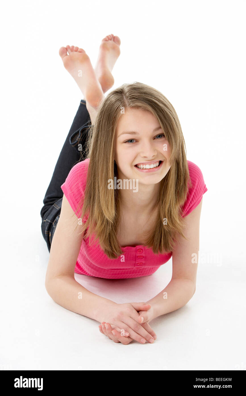 Teenage Girl Laying on Stomach Stock Photo - Alamy