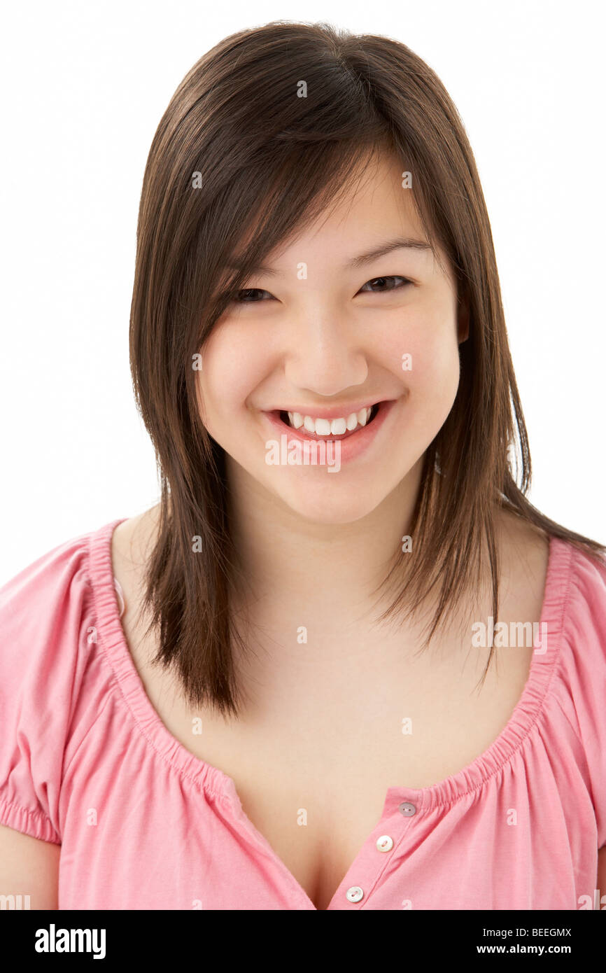 Studio Portrait of Smiling Teenage Girl Stock Photo - Alamy