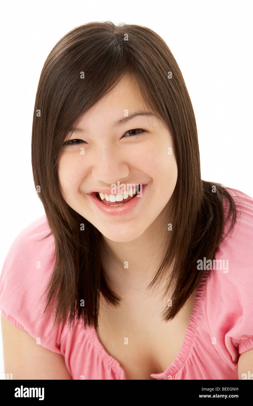Studio Portrait of Smiling Teenage Girl Stock Photo - Alamy