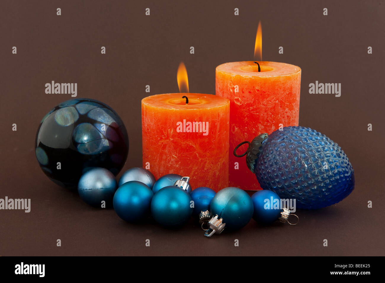 Christmas candles and decoration with brown background Stock Photo