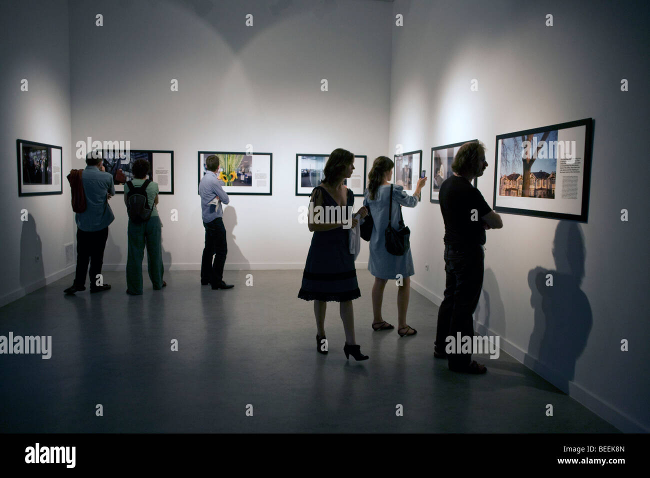 Visitors to the Werk Nu show at the Z33 gallery read captions to the ...