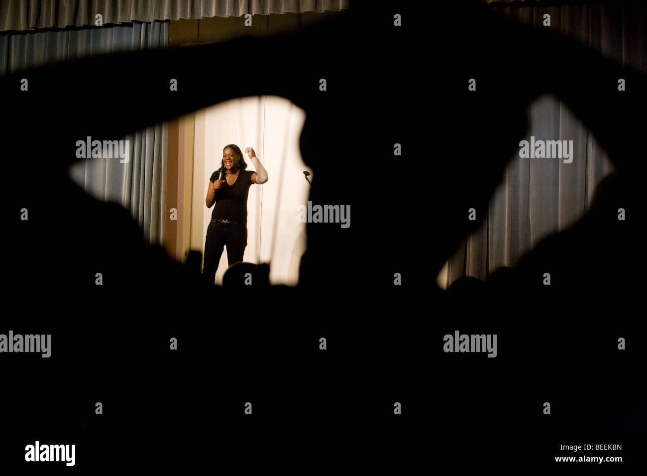Stand-up comedian Ava Bidal performs her routine at a South London school Stock Photo