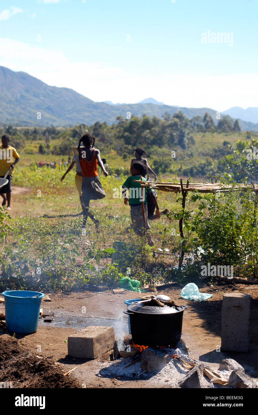 Madagascar - Children play whilst lunch is cooking at the Anosy village of Agnena. Stock Photo