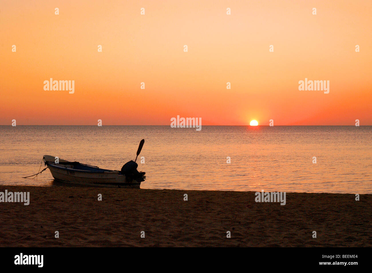 Madagascar - Fishing boats on Ifaty Beach at sunset Stock Photo