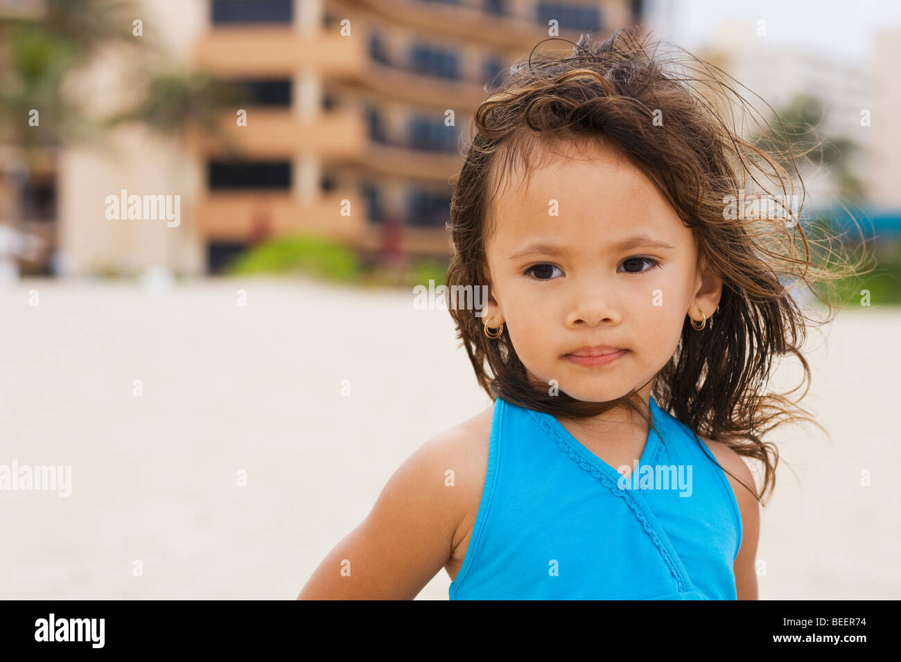 Mixed race girl on beach Stock Photo Alamy