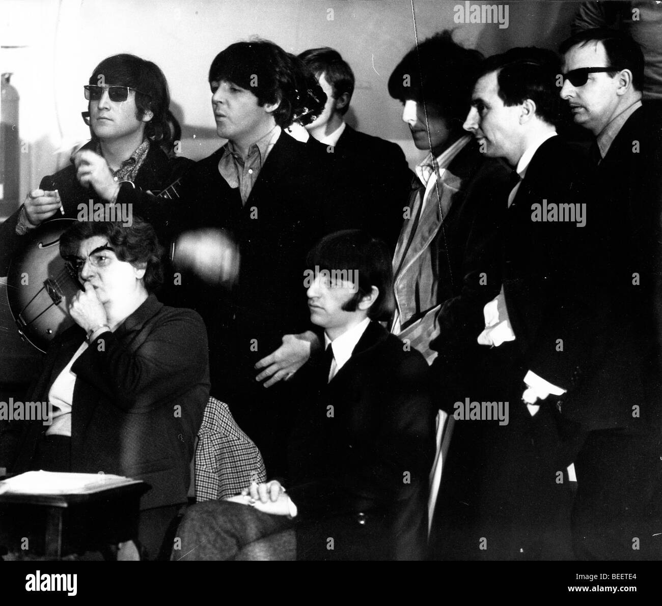 The Beatles waiting to begin their recording session at EMI Studios Stock Photo
