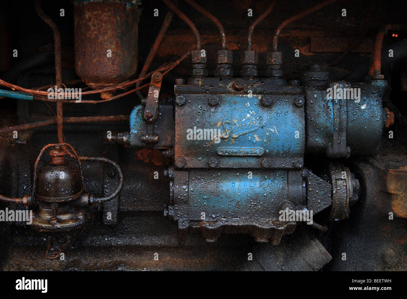 'Rusty tractor engine' Cromer Beach, Norfolk, England. Stock Photo