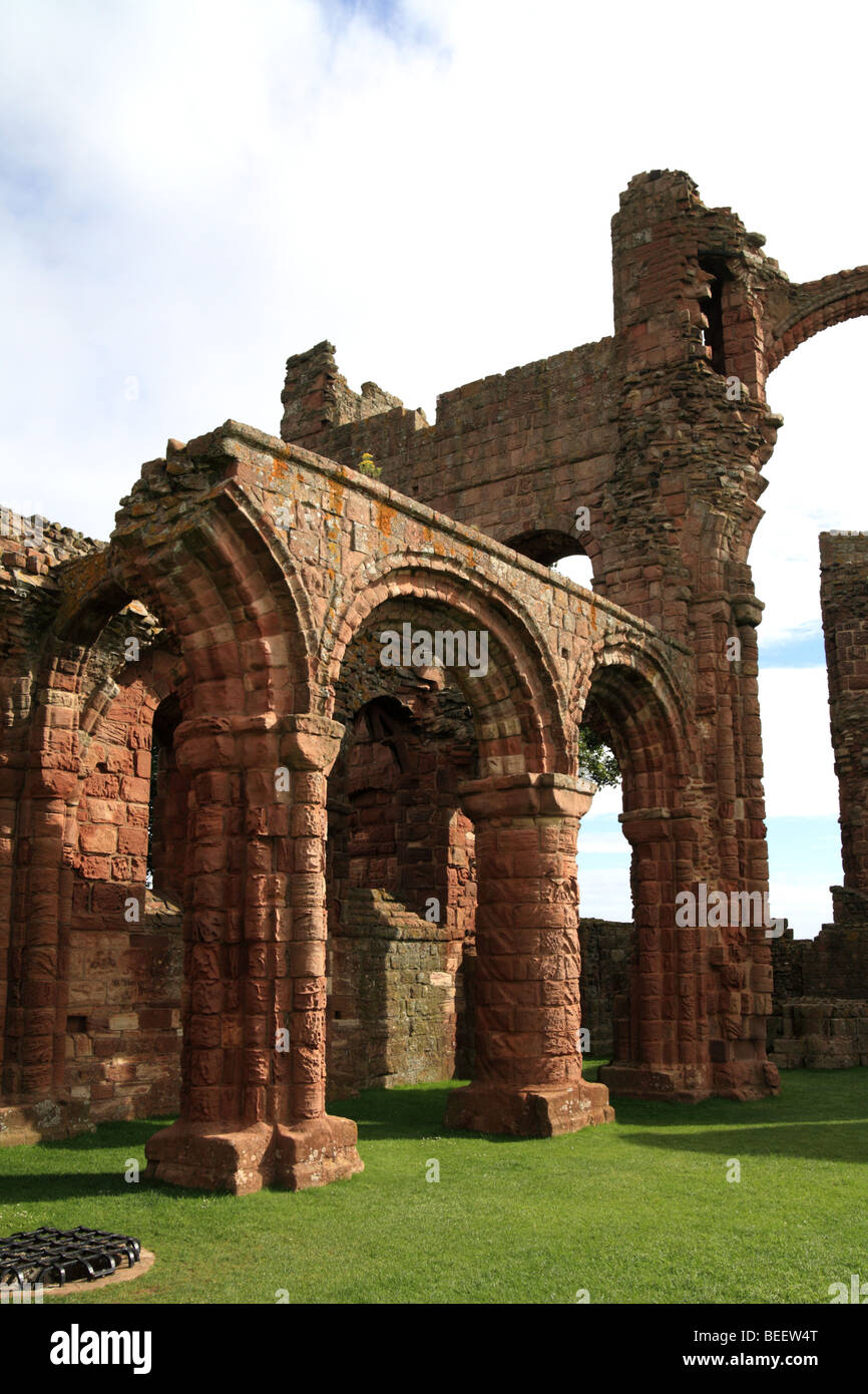 'Lindisfarne priory' ruin, St Cuthbert burial place, English Heritage, Holy Island, Northumberland, UK Stock Photo