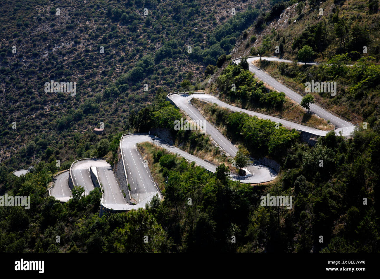 Hairpin Bends In The Road Through Hills In Southern France Stock