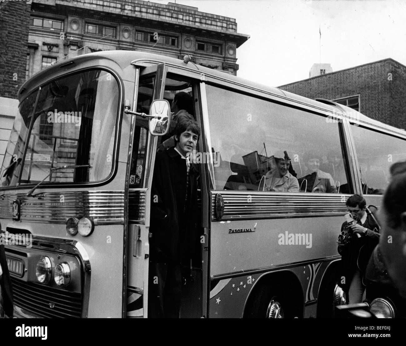 Singer Paul McCartney with 'Magical Mystery Tour' bus Stock Photo
