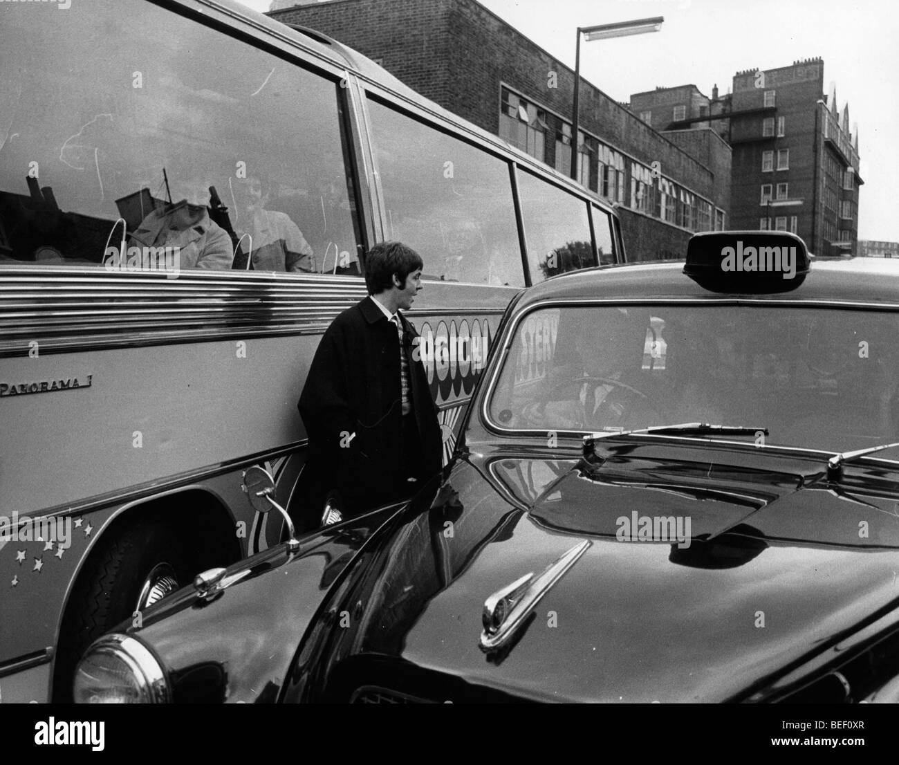 Singer Paul McCartney with 'Magical Mystery Tour' bus Stock Photo