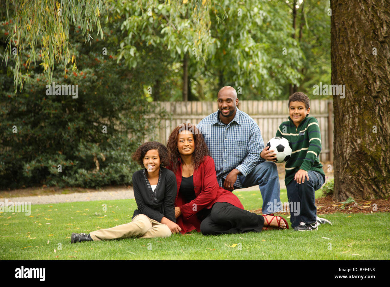 Family portrait in yard Stock Photo