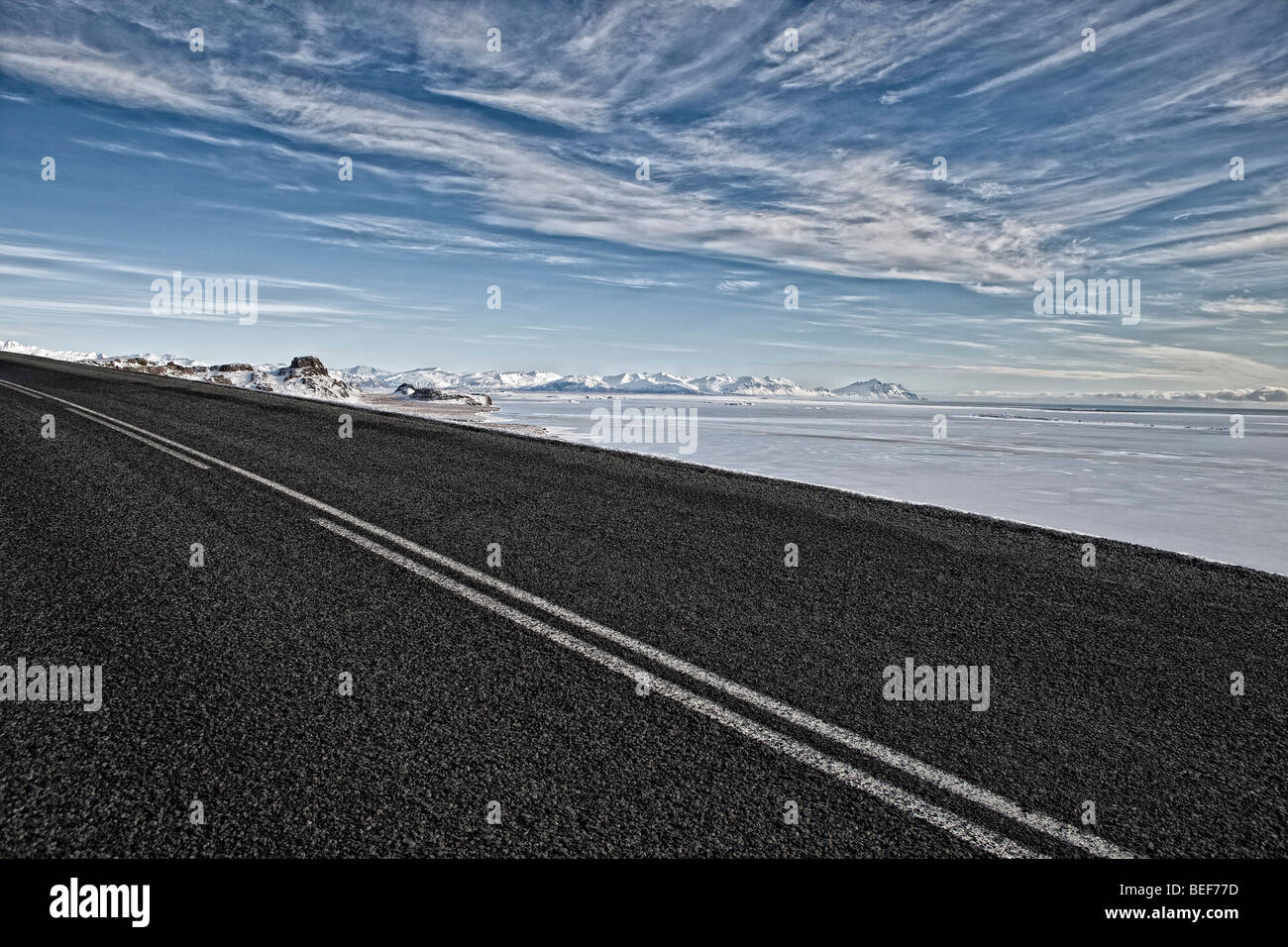Road with mountains in background in Hornafjordur, Iceland Stock Photo