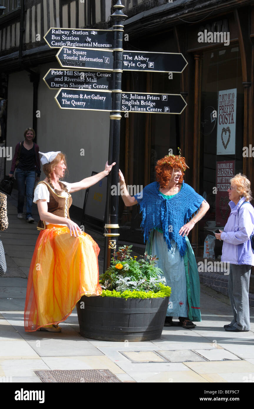 Actors dressed as prostitutes at Shrewsbury Street Theatre Festival Shropshire Stock Photo