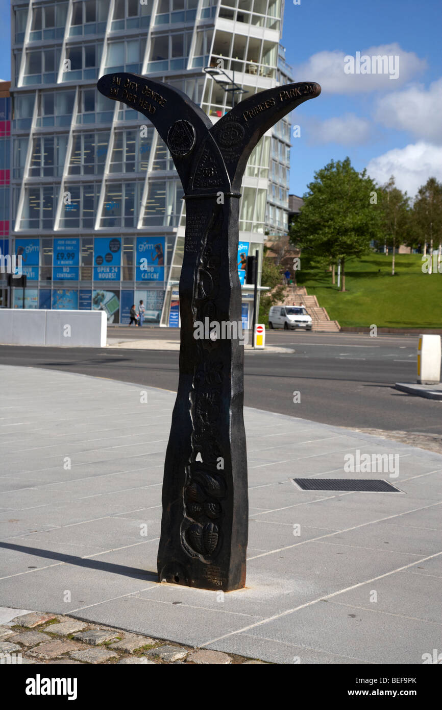 national cycle route network 56 signpost in front of modern apartment and office block at liverpool one liverpool Stock Photo