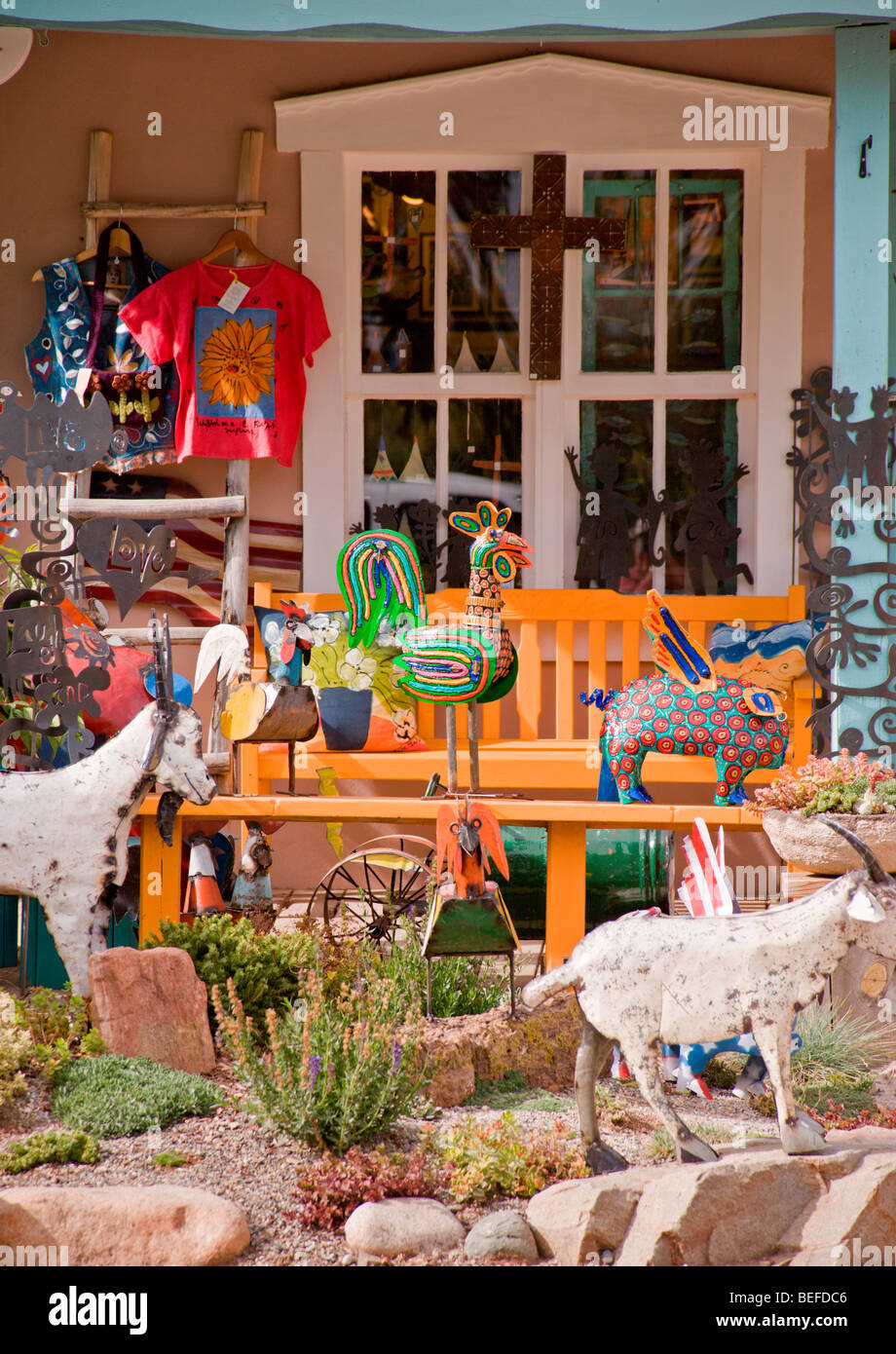 A whimsical sculpture garden stands in front of an art gallery, in the arts and crafts town of Arroyo Seco, New Mexico. Stock Photo