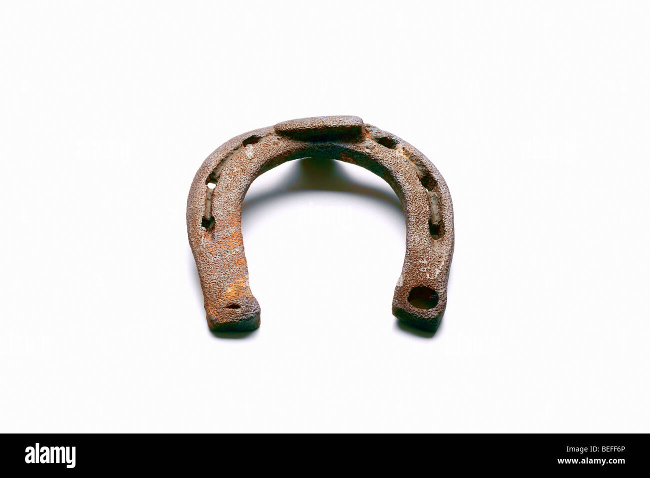 old rusty horseshoe isolated on white background - clipping path Stock Photo