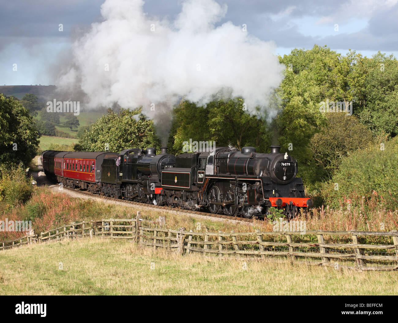 A double headed steam train hauled by BR standard 2-6-0 76079 and SDJR 2-8-0 53809 at Green End on the North Yorkshire Moors Railway, England, UK Stock Photo