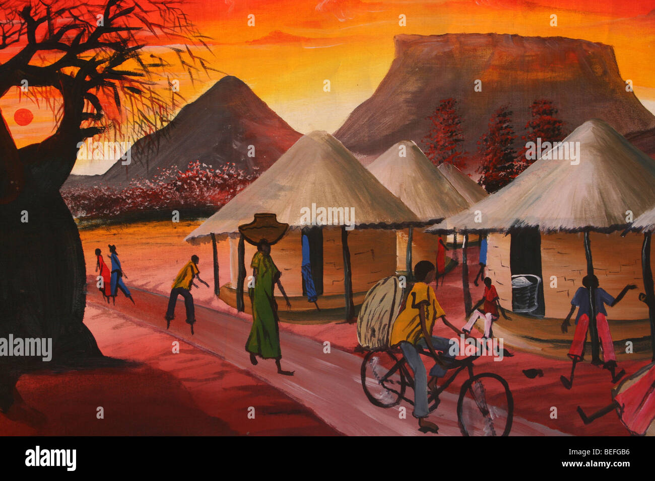 African Painting In Reds And Oranges Showing Typical Village Scene Stock Photo