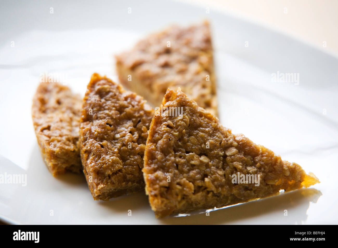 A flap jack on a plate Stock Photo