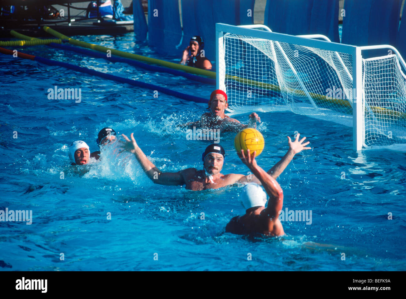 Olympic water polo teams competing at Pepperdine University pool Stock Photo