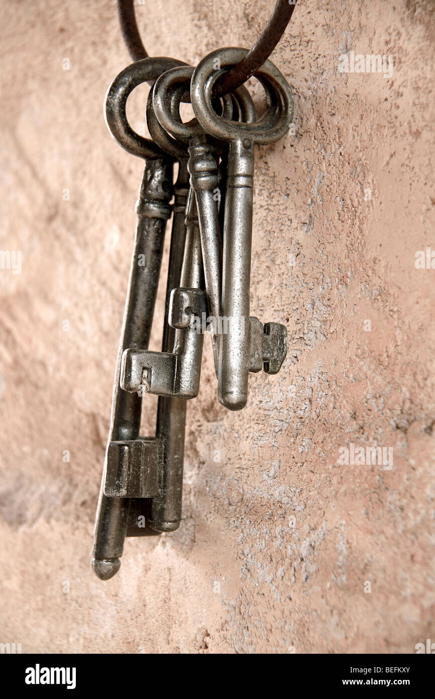 A set of keys hanging on a wall Stock Photo Alamy