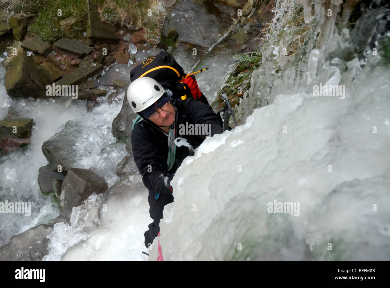 Mountaineer climbing on icefall hi-res stock photography and images - Alamy