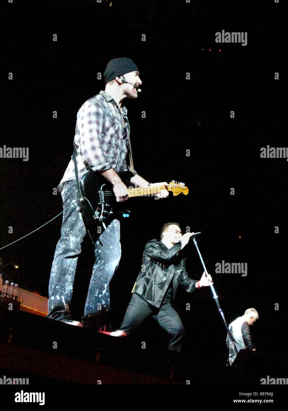 The Edge, guitarist of the Irish rock band U2, performs live with vocalist Bono and bassist Adam Clayton during their 360 Tour. Stock Photo