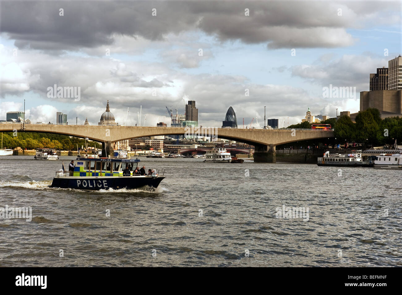 A Thames River Police boat patrolling on the River Thames in London. Stock Photo