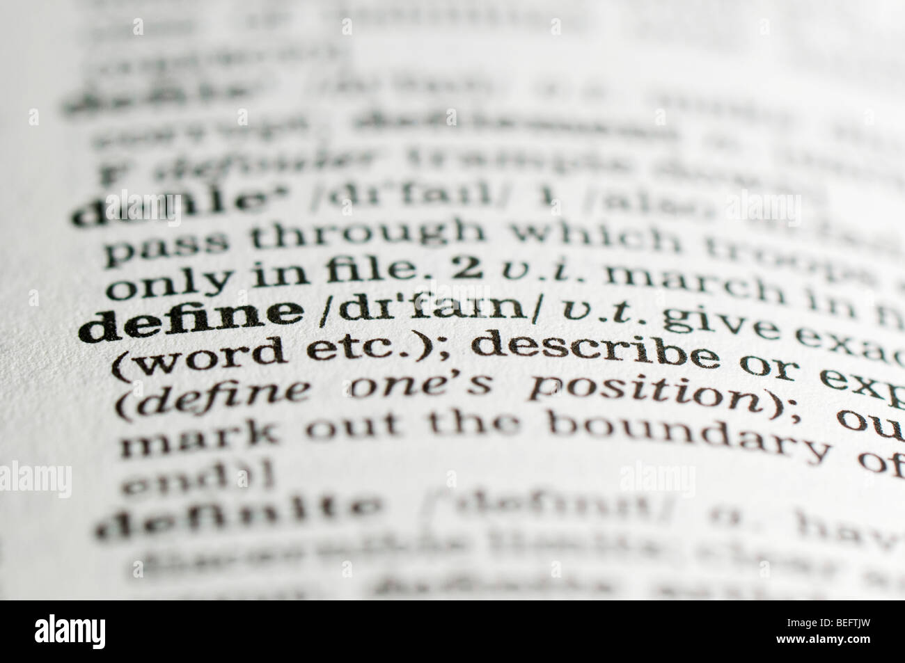 Close up of dictionary definition of word define Stock Photo