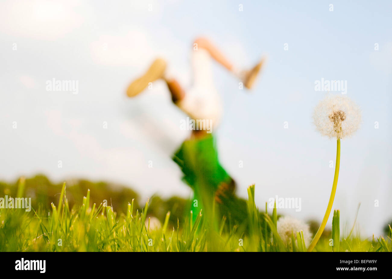 Boy doing handstand. Stock Photo