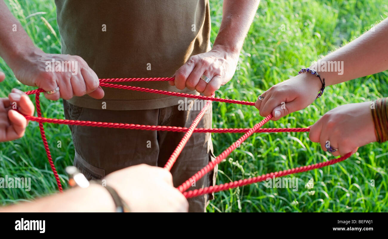 Coomunication Using Rope People creating network with ropes Stock Photo - Alamy