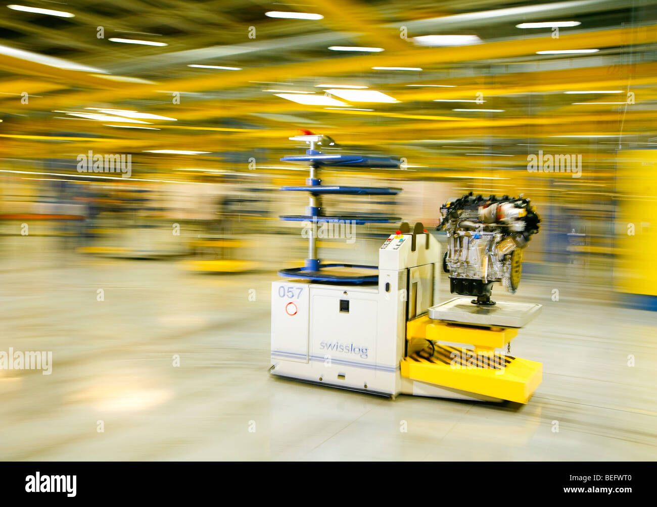 BWM Hams Hall Plant, Coleshill, North Warwickshire. Robot carrying BMW engine. Stock Photo