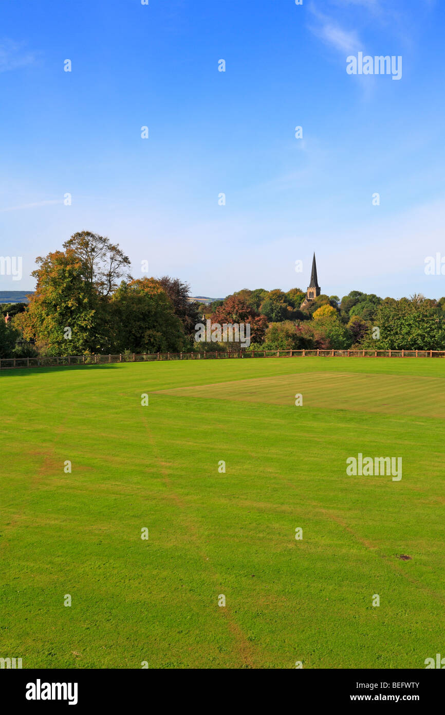 The cricket pitch towards Holy Trinity Church, Wentworth, Rotherham, South Yorkshire, England UK. Stock Photo