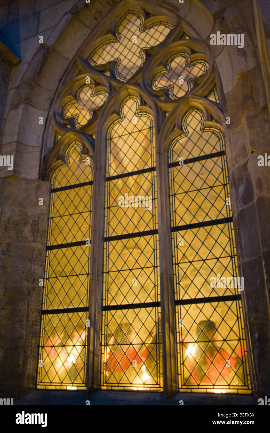 Play of light in the stained-glass windows of the abby Stock Photo