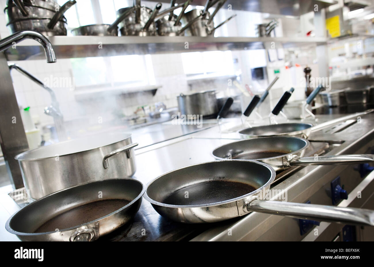 Skillets in a kitchen Stock Photo