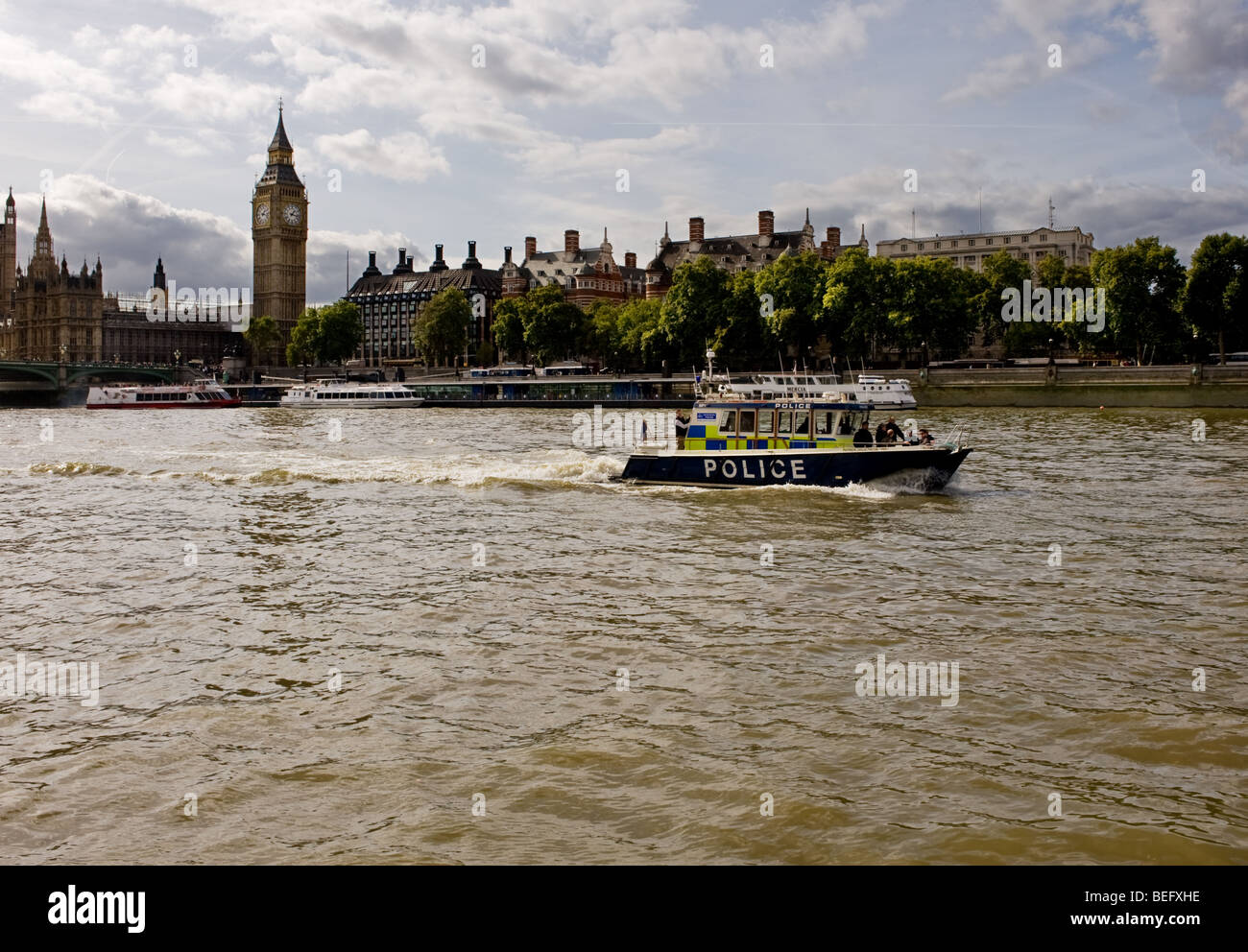 A Thames River Police boat sailing down the River Thames in London. Stock Photo