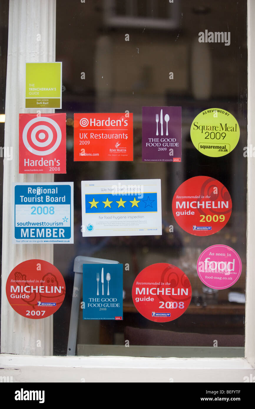 Food Guide Stickers In A Restaurant Window Stock Photo