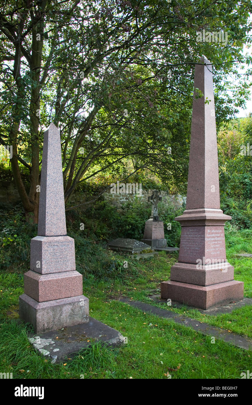Grave and monument to Ironmaster Crawshay Bailey and (the smaller stone) to John Jones Llanfoist churchyard Wales UK Stock Photo