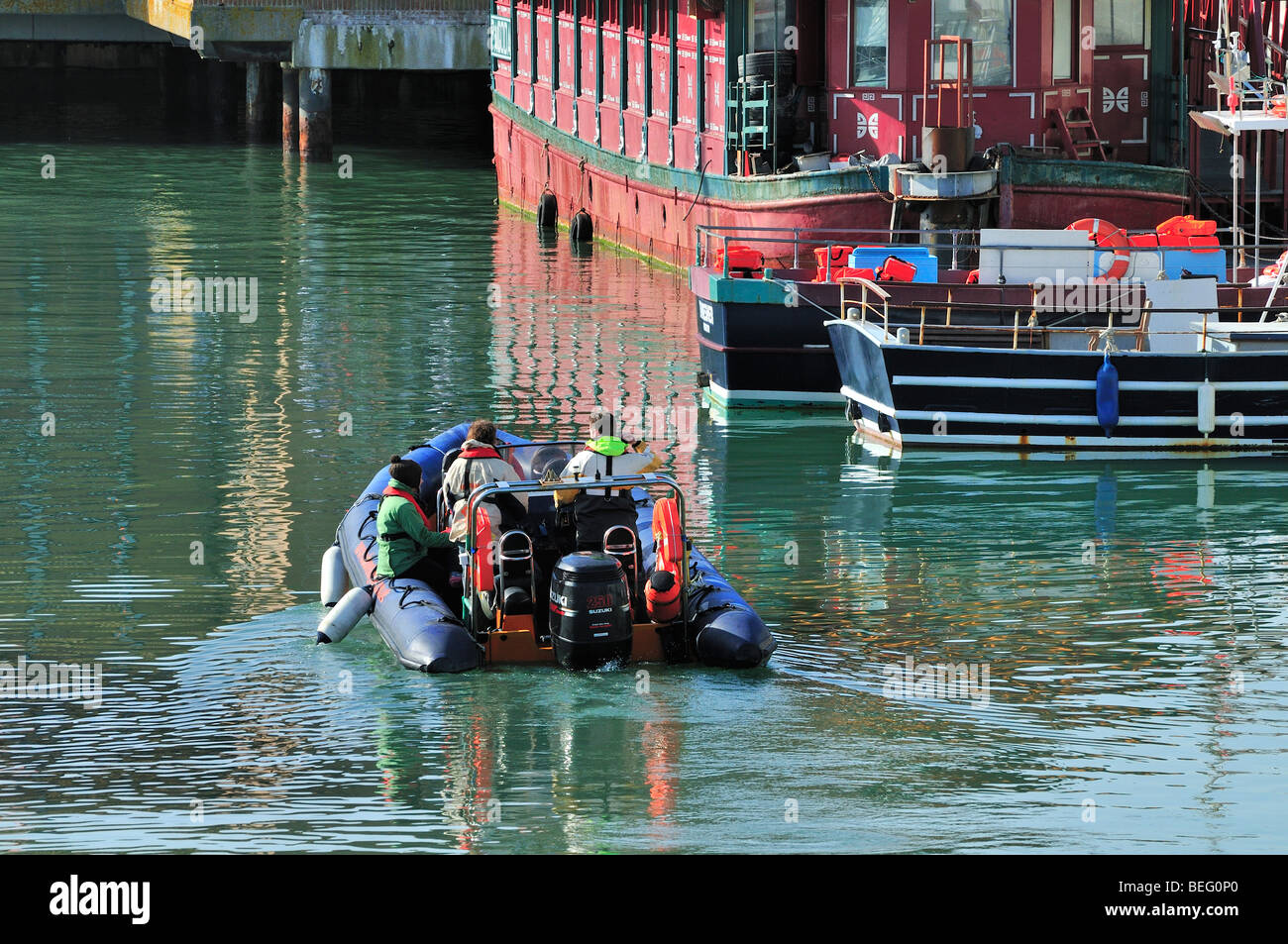 Brighton Marina,back view inflatable floating leisure Stock Photo - Alamy
