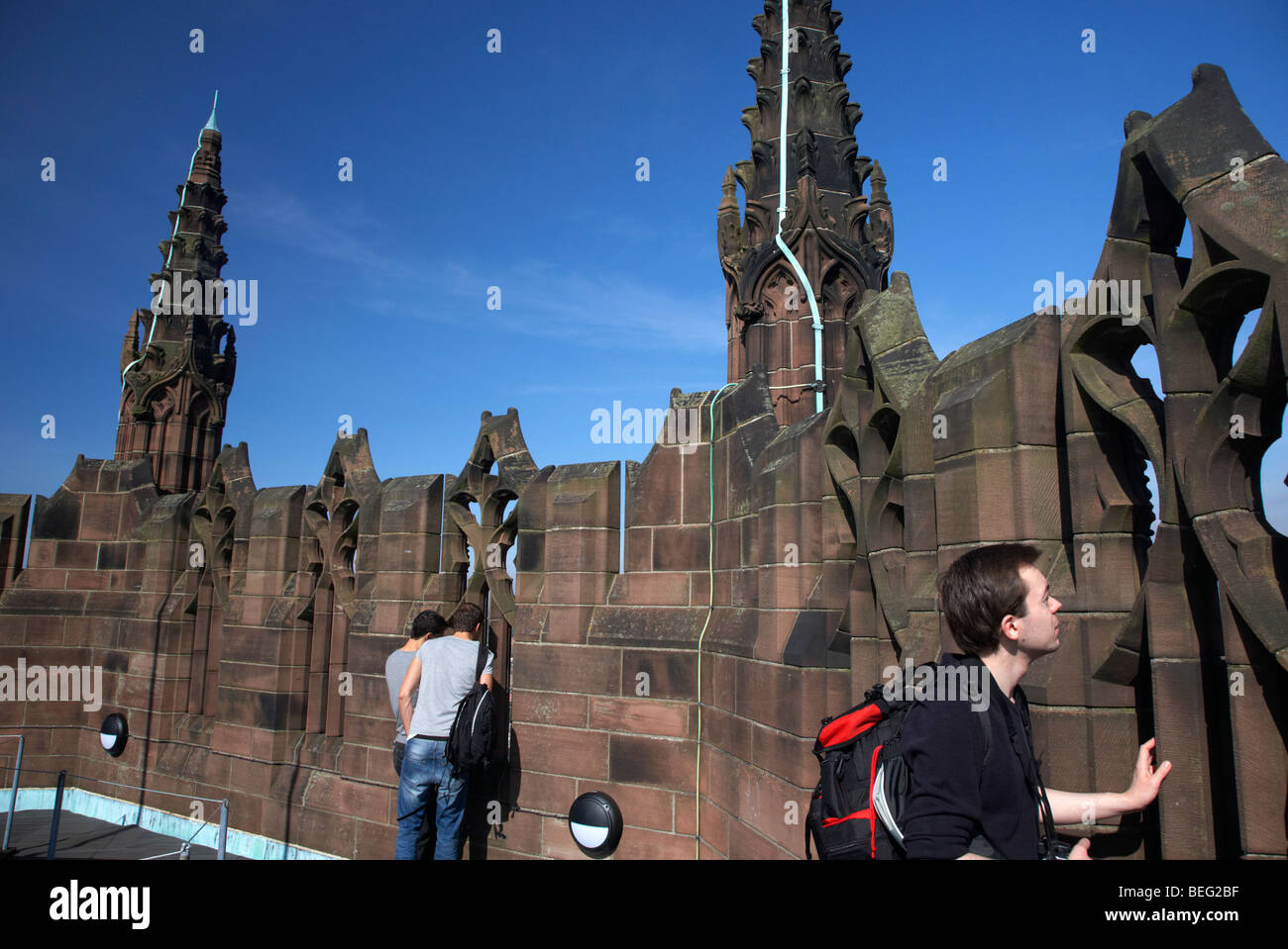 tourists looking down from the vestey tower the belltower of the Cathedral Church of Christ Liverpool Anglican Cathedral Stock Photo
