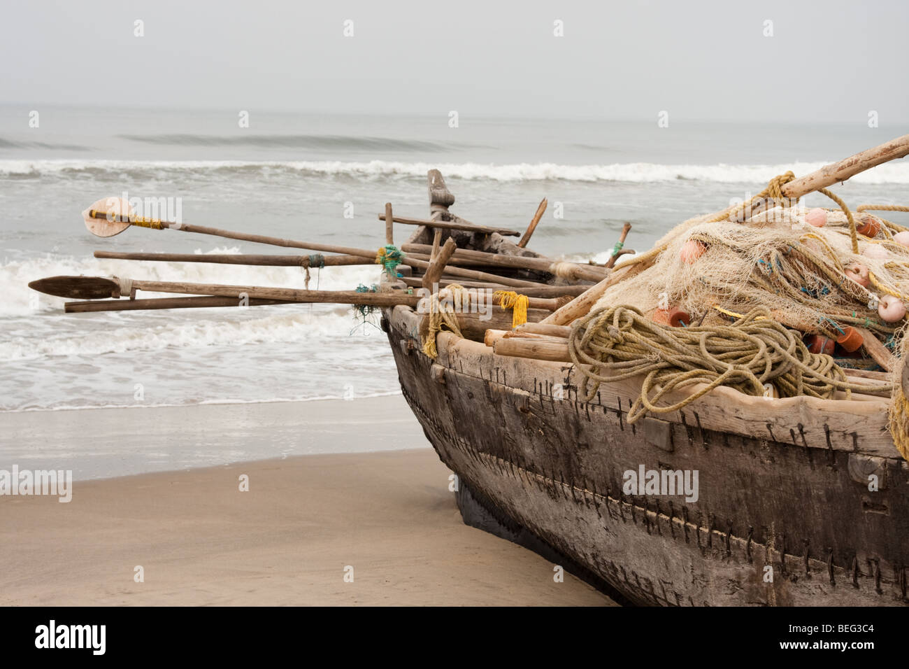 Fisherman boat full with gear at the beach Stock Photo