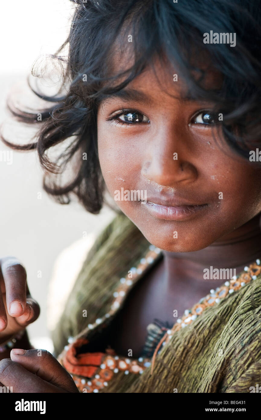 Happy young Indian street girl smiling, selective focus Stock Photo