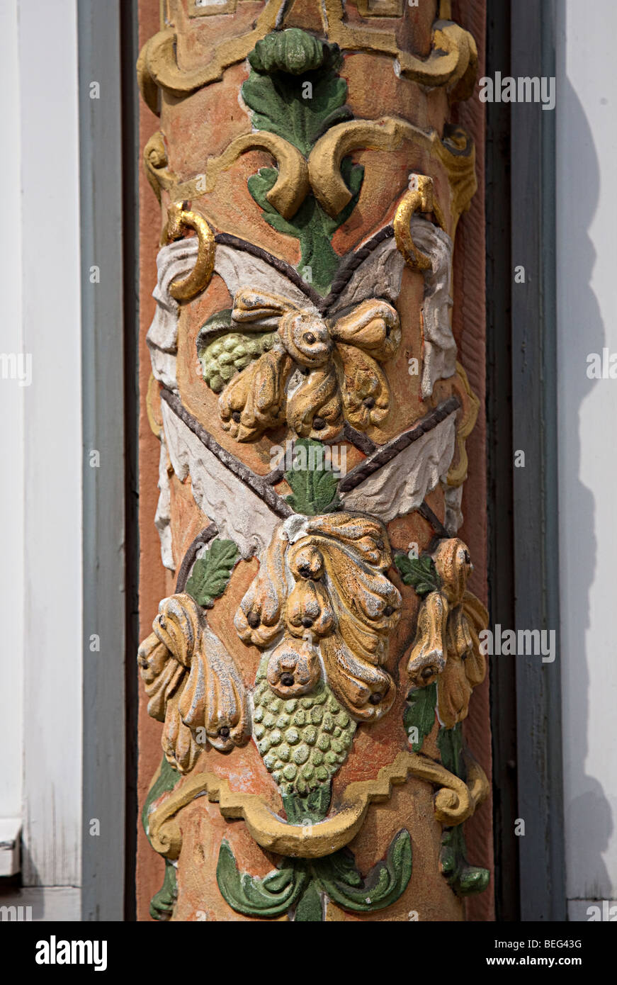 Detail of carved and painted surround on house Hamelin Germany Stock Photo
