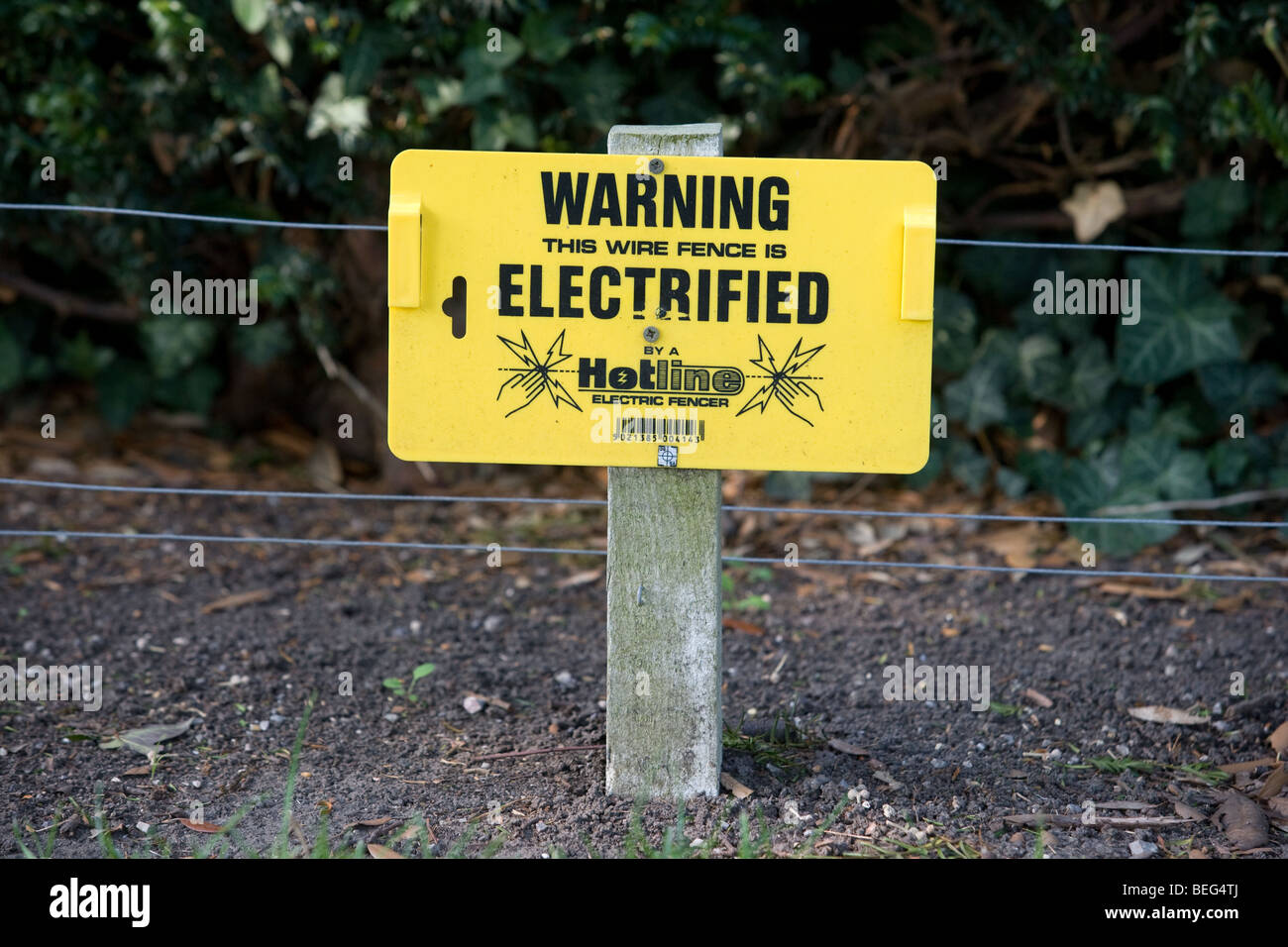 Warning Electrified Fence Sign Stock Photo
