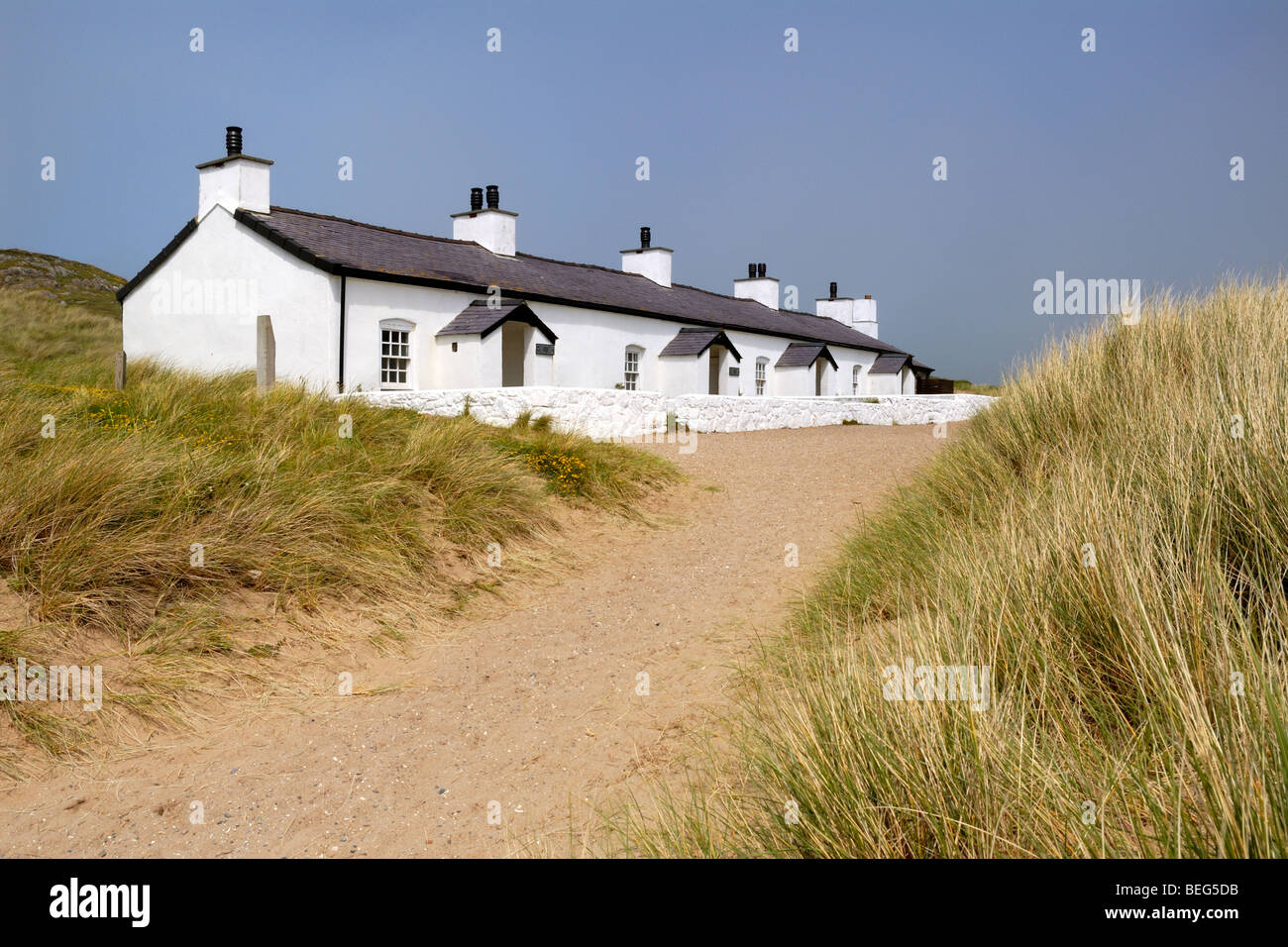 Terrace of Pilot's Cottages on Ynys Llanddwyn on Anglesey Stock Photo