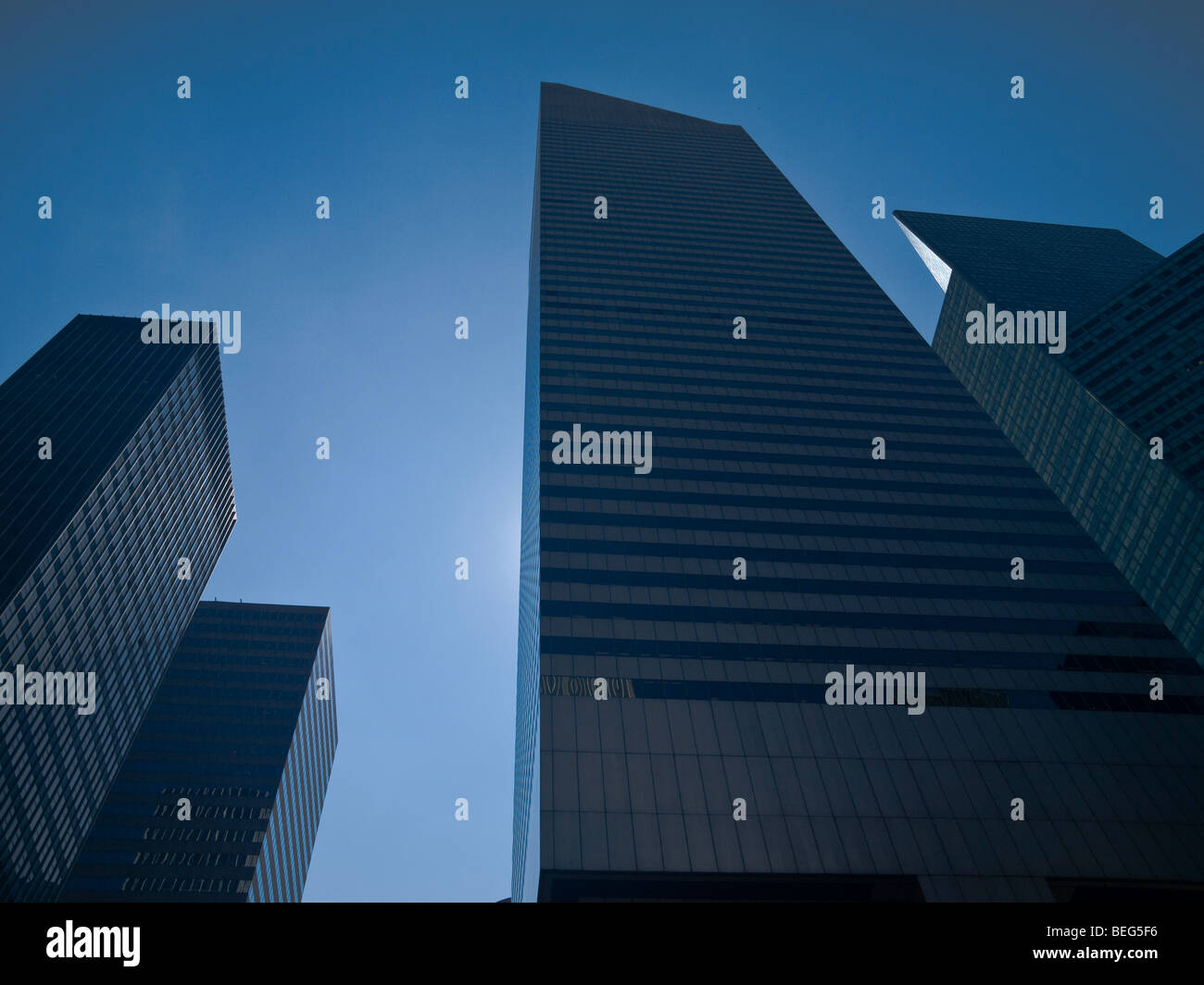 High modern skyscrapers on a background of a blue sky. Stock Photo