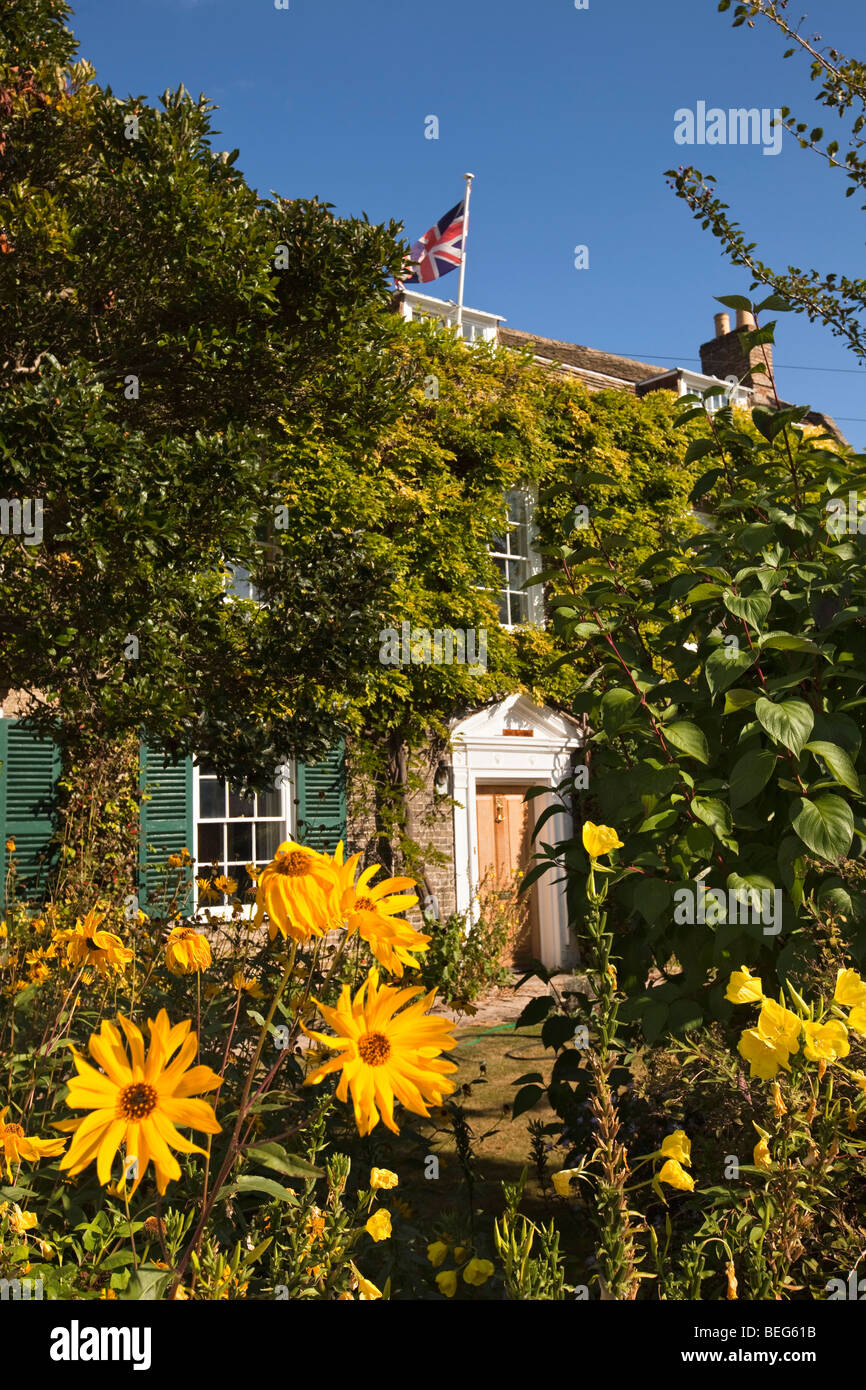 England, Cambridgeshire, Hemingford Grey, colourful flowers in front