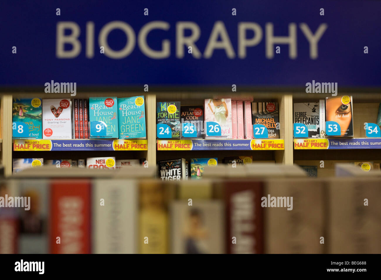 WH Smiths biographical literature on sale in departures shopping area of Heathrow airport's Terminal 5. Stock Photo