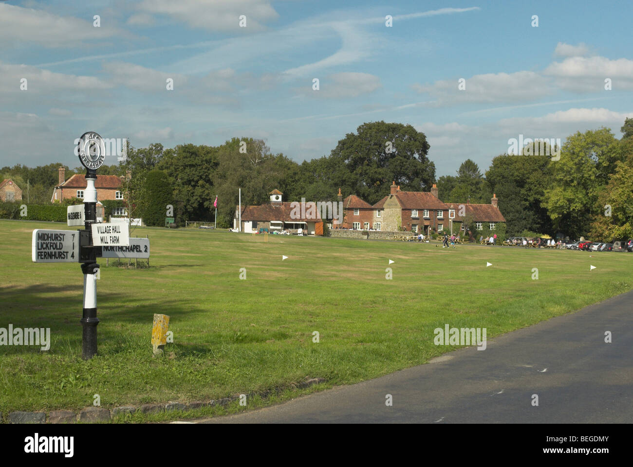 Directions To Village Green A Sign Post Gives Directions On Lurgashall Village Green In West Sussex  Stock Photo - Alamy